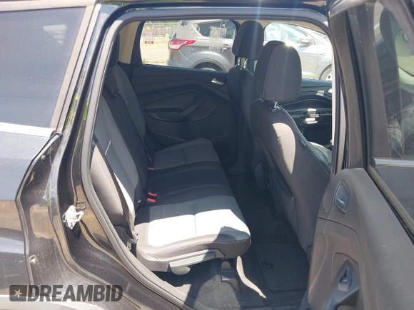 2014 Ford Escape SE z VIN 1FMCU9GX4EUC33710, wystawiony jako IAAI lot #42549888 z przebiegiem 117 057 mil mil oraz . Historia ofert i sprzedaży dostępna na DreamBid. Obrazek 8.