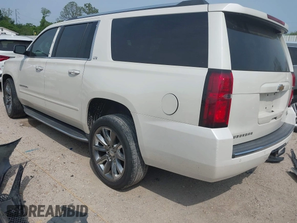 2015 Chevrolet Suburban LTZ with VIN 1GNSCKKC5FR740352, listed as a IAAI auction lot 39075234 with 112,945 mi miles and . Bid and sale history available at DreamBid. Image 3.