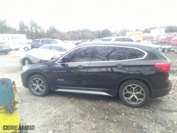 2018 BMW X1 sDrive28i with VIN WBXHU7C3XJ5H39991, listed as a IAAI auction lot 41726648 with NaN miles. Bid and sale history available at carsss.com. Image 14.