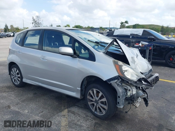 2012 Honda Fit Sport with VIN JHMGE8H5XCC034799, listed as a IAAI auction lot 41957184 with 86,373 mi miles. Bid and sale history available at carsss.com. Image 1.