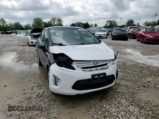 2013 Ford Fiesta SE z VIN 3FADP4EJ8DM146676, wystawiony jako Copart lot #55565485 z przebiegiem 168 801 mil mil oraz Szkoda całkowita • Salvage title. Historia ofert i sprzedaży dostępna na DreamBid. Obrazek 13.