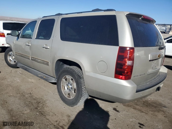 2013 Chevrolet Suburban LT with VIN 1GNSCJE00DR311435, listed as a Copart auction lot 42868595 with 200,446 mi miles and Salvage Title. Bid and sale history available at carsss.com. Image 2.