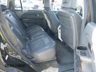 2003 Honda Pilot EX z VIN 2HKYF18713H612854, wystawiony jako IAAI lot #41344126 z przebiegiem 152 331 mil mil oraz . Historia ofert i sprzedaży dostępna na DreamBid. Obrazek 8.