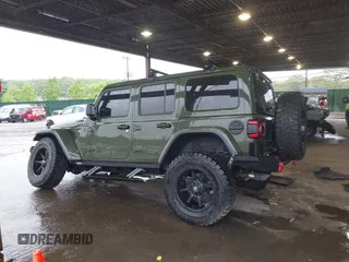 2021 Jeep Wrangler Unlimited Rubicon with VIN 1C4HJXFG4MW543254, listed as a IAAI auction lot 42316180 with 50,696 mi miles and . Bid and sale history available at DreamBid. Image 14.