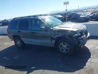 1999 Jeep Grand Cherokee Laredo with VIN 1J4GW58N2XC652678, listed as a IAAI auction lot 42290732 with 145,602 mi miles and . Bid and sale history available at DreamBid. Image 13.