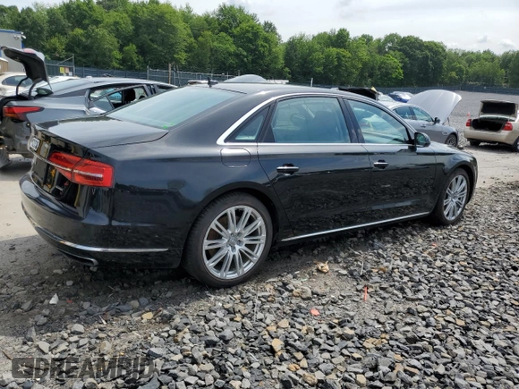2015 Audi A8 3.0T with VIN WAU3GAFD0FN036465, listed as a Copart auction lot 64069035 with 100,149 mi miles and Salvage title. Bid and sale history available at DreamBid. Image 3.