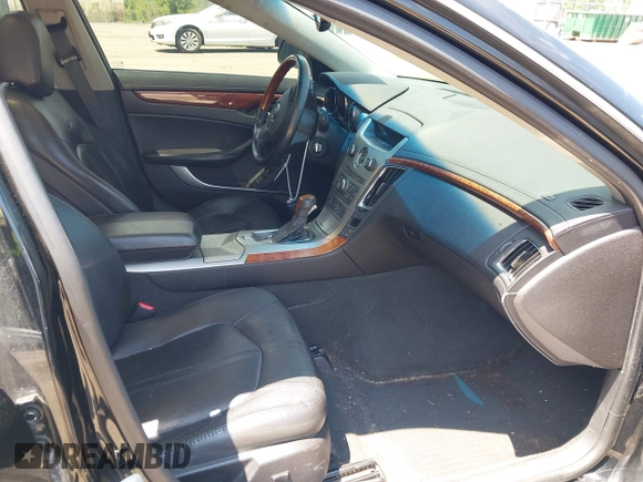 2011 Cadillac CTS Premium with VIN 1G6DS5ED4B0105859, listed as a IAAI auction lot 42494741 with 143,128 mi miles and . Bid and sale history available at DreamBid. Image 5.