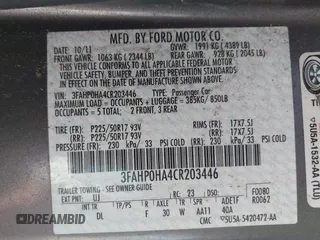 2012 Ford Fusion SE with VIN 3FAHP0HA4CR203446, listed as a IAAI auction lot 42093330 with 185,703 mi miles. Bid and sale history available at carsss.com. Image 9.