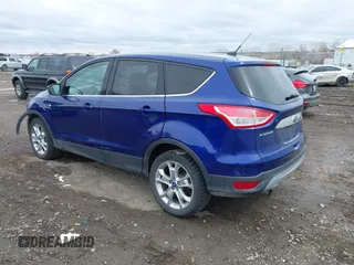 2013 Ford Escape SEL with VIN 1FMCU9H92DUA47288, listed as a IAAI auction lot 41912588 with 165,728 mi miles. Bid and sale history available at carsss.com. Image 3.