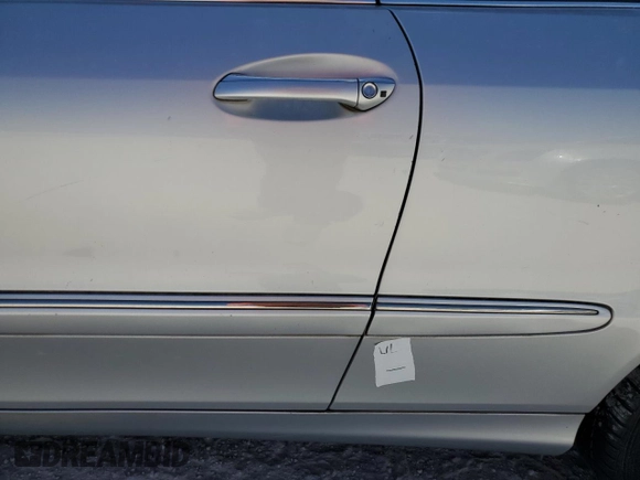 2007 Mercedes-Benz CLK-Class 3.5L with VIN WDBTK56FX7F206030, listed as a Copart auction lot 77271194 with 155,157 mi miles and Salvage Title. Bid and sale history available at carsss.com. Image 12.