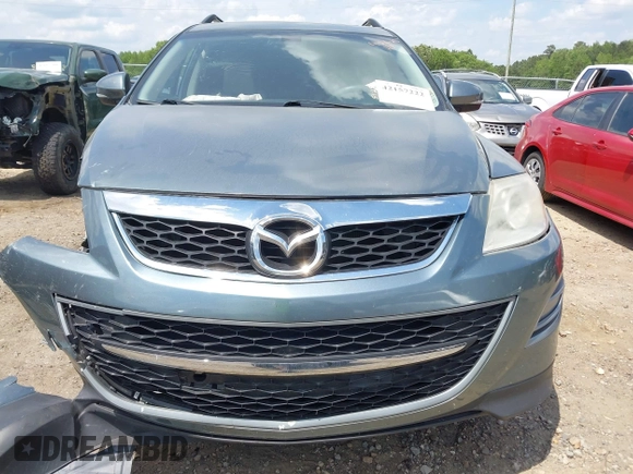 2012 Mazda CX-9 Grand Touring z VIN JM3TB2DA1C0334863, wystawiony jako IAAI lot #42157222 z przebiegiem 277 786 mil mil oraz . Historia ofert i sprzedaży dostępna na DreamBid. Obrazek 12.