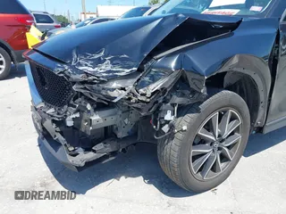 2017 Mazda CX-5 Grand Touring with VIN JM3KFBDL6H0200830, listed as a IAAI auction lot 42005145 with 90,510 mi miles. Bid and sale history available at carsss.com. Image 6.