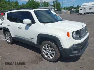 2015 Jeep Renegade Latitude z VIN ZACCJBBT1FPC17542, wystawiony jako IAAI lot #42290315 z przebiegiem 91 313 mil mil oraz . Historia ofert i sprzedaży dostępna na DreamBid. Obrazek 1.