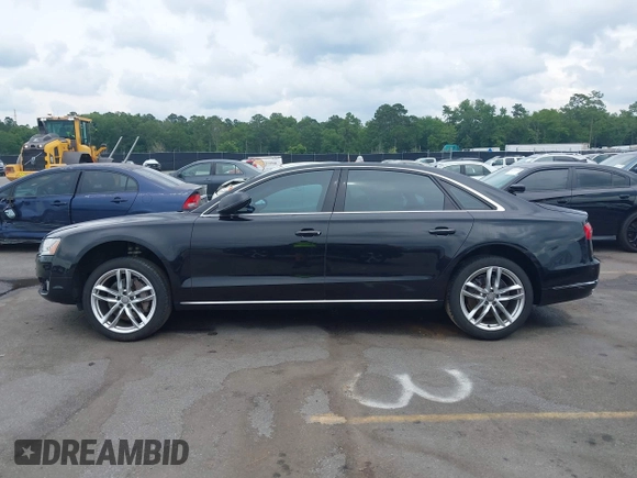 2015 Audi A8 4.0T z VIN WAU32AFD9FN023826, wystawiony jako IAAI lot #42353372 z przebiegiem 94 833 mil mil oraz . Historia ofert i sprzedaży dostępna na DreamBid. Obrazek 14.