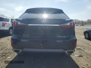 2018 Lexus RX 350 z VIN 2T2BZMCA8JC165954, wystawiony jako Copart lot #54001415 z przebiegiem 79 758 mil mil oraz Szkoda całkowita • Salvage title. Historia ofert i sprzedaży dostępna na DreamBid. Obrazek 6.