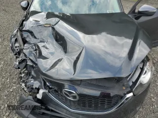 2015 Mazda CX-5 Sport with VIN JM3KE4BYXF0511249, listed as a Copart auction lot 63310695 with 208,615 mi miles and Salvage title. Bid and sale history available at DreamBid. Image 12.