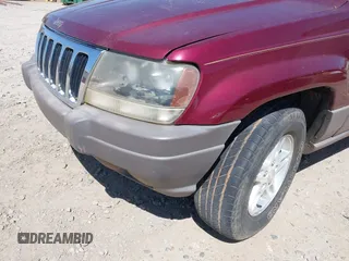 2003 Jeep Grand Cherokee Laredo with VIN 1J4GX48S93C523831, listed as a IAAI auction lot 41852442 with 270,735 mi miles. Bid and sale history available at carsss.com. Image 6.