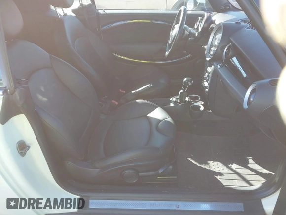 2011 MINI Convertible S with VIN WMWZP3C54BTX82748, listed as a IAAI auction lot 41817396 with 113,458 mi miles and . Bid and sale history available at DreamBid. Image 5.
