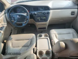 2004 Honda Odyssey EX-L with VIN 5FNRL18024B008617, listed as a Copart auction lot 58831435 with Not provided miles and Salvage title. Bid and sale history available at DreamBid. Image 8.