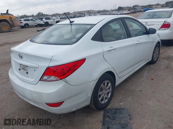 2013 Hyundai Accent GLS with VIN KMHCT4AE3DU325550, listed as a IAAI auction lot 41185651 with 128,791 mi miles and . Bid and sale history available at DreamBid. Image 4.