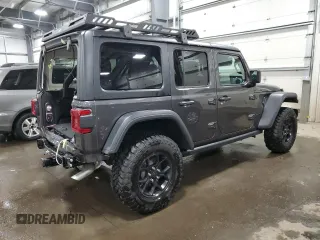 2024 Jeep Wrangler Willys with VIN 1C4PJXDG5RW312580, listed as a Copart auction lot 49144005 with 5,713 mi miles and Salvage Title. Bid and sale history available at carsss.com. Image 3.