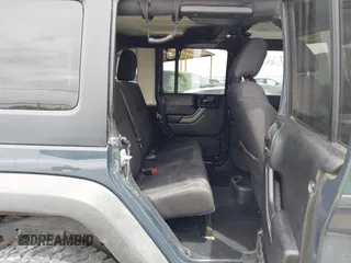 2017 Jeep Wrangler Unlimited Sport with VIN 1C4BJWDG2HL634291, listed as a IAAI auction lot 42242223 with 145,880 mi miles and . Bid and sale history available at DreamBid. Image 8.