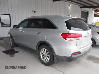 2018 Kia Sorento LX with VIN 5XYPG4A55JG360565, listed as a IAAI auction lot 41031059 with 138,963 mi miles and . Bid and sale history available at DreamBid. Image 3.
