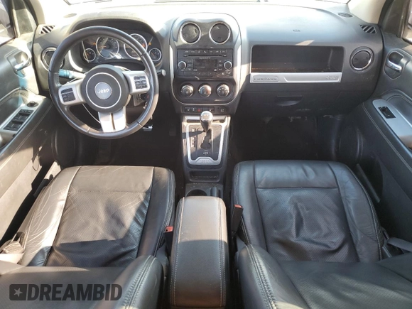 2017 Jeep Compass High Altitude with VIN 1C4NJCEB1HD199112, listed as a Copart auction lot 55627155 with 184,536 mi miles and Salvage title. Bid and sale history available at DreamBid. Image 8.