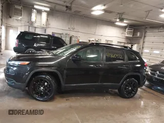 2014 Jeep Cherokee Latitude with VIN 1C4PJMCS0EW291135, listed as a IAAI auction lot 41860372 with 171,524 mi miles and . Bid and sale history available at DreamBid. Image 14.