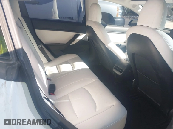 2021 Tesla Model 3 Performance with VIN 5YJ3E1EC6MF926448, listed as a IAAI auction lot 41240309 with 39,386 mi miles and . Bid and sale history available at DreamBid. Image 8.