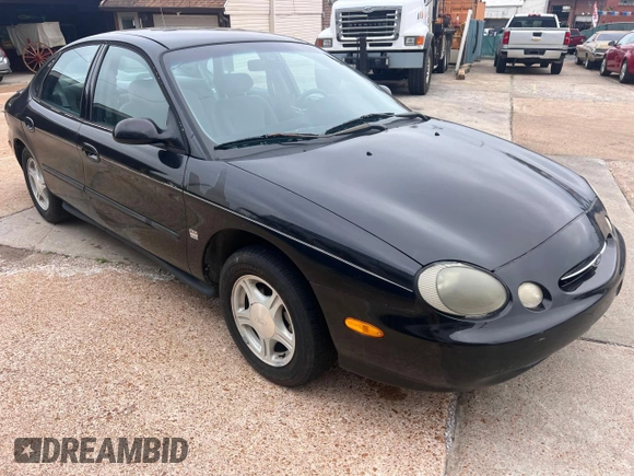 1999 Ford Taurus SE with VIN 1FAFP53SXXA145301, listed as a Copart auction lot 60351535 with 57,262 mi miles and Clean title. Bid and sale history available at DreamBid. Image 1.