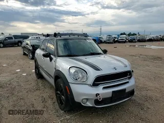2015 MINI Countryman S z VIN WMWZC3C53FWT04644, wystawiony jako Copart lot #56415645 z przebiegiem 136 552 mil mil oraz Szkoda całkowita • Salvage title. Historia ofert i sprzedaży dostępna na DreamBid. Obrazek 14.