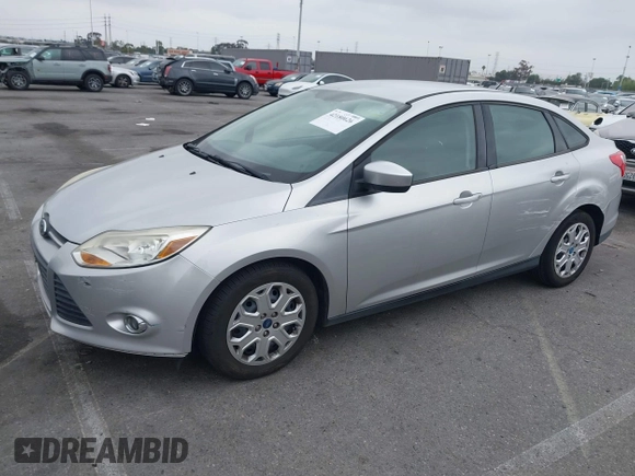 2012 Ford Focus SE with VIN 1FAHP3F27CL257447, listed as a IAAI auction lot 42180626 with 130,155 mi miles. Bid and sale history available at carsss.com. Image 2.