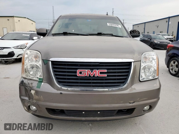2011 GMC Yukon SLT z VIN 1GKS1CE01BR359134, wystawiony jako Copart lot #53693295 z przebiegiem 95 060 mil mil oraz Szkoda całkowita • Salvage title. Historia ofert i sprzedaży dostępna na DreamBid. Obrazek 5.