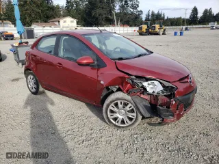 2014 Mazda Mazda2 Sport with VIN JM1DE1KZ9E0186729, listed as a Copart auction lot 73205454 with 123,050 mi miles and Salvage Title. Bid and sale history available at carsss.com. Image 4.