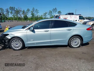 2014 Ford Fusion SE Hybrid with VIN 3FA6P0LU3ER373311, listed as a IAAI auction lot 42048513 with 155,935 mi miles. Bid and sale history available at carsss.com. Image 14.