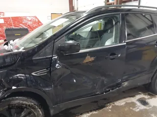 2018 Ford Escape SE with VIN 1FMCU9GD7JUD36295, listed as a IAAI auction lot 41855037 with 85,305 mi miles. Bid and sale history available at carsss.com. Image 19.