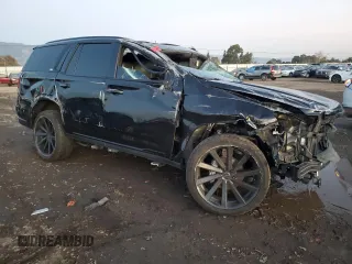 2021 Cadillac Escalade Sport Platinum with VIN 1GYS4GKL3MR199859, listed as a Copart auction lot 85749144 with 73,634 mi miles and Salvage title. Bid and sale history available at DreamBid. Image 4.