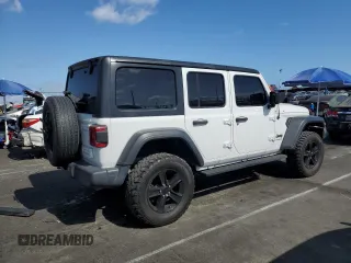 2019 Jeep Wrangler Unlimited Sport Altitude with VIN 1C4HJXDG2KW675235, listed as a Copart auction lot 54389785 with 88,825 mi miles and Salvage title. Bid and sale history available at DreamBid. Image 3.