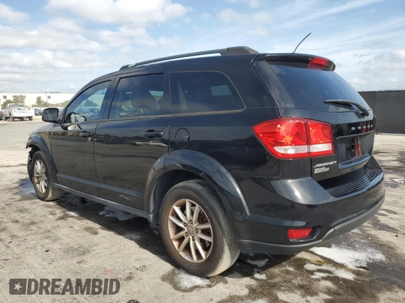 2014 Dodge Journey SXT with VIN 3C4PDCBB5ET198619, listed as a Copart auction lot 54229165 with 167,852 mi miles and Salvage Title. Bid and sale history available at carsss.com. Image 2.