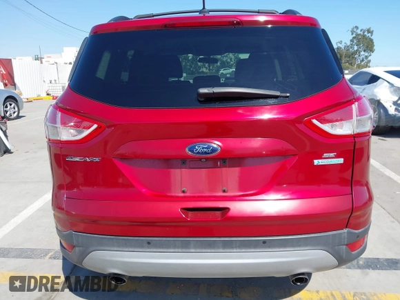 2014 Ford Escape SE with VIN 1FMCU0GX7EUD80714, listed as a IAAI auction lot 41981789 with 84,626 mi miles and . Bid and sale history available at DreamBid. Image 16.