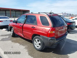 2007 Kia Sportage LX with VIN KNDJF724577371572, listed as a IAAI auction lot 41817960 with 213,062 mi miles. Bid and sale history available at carsss.com. Image 14.