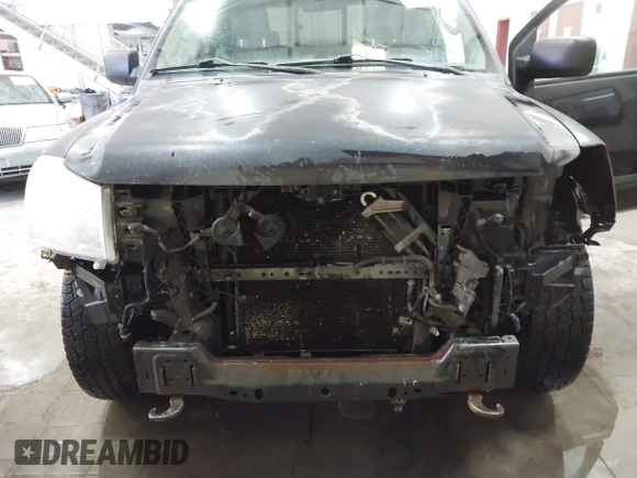 2006 Nissan Titan XE z VIN 1N6AA06B36N561375, wystawiony jako IAAI lot #42055054 z przebiegiem 160 381 mil mil oraz . Historia ofert i sprzedaży dostępna na DreamBid. Obrazek 6.