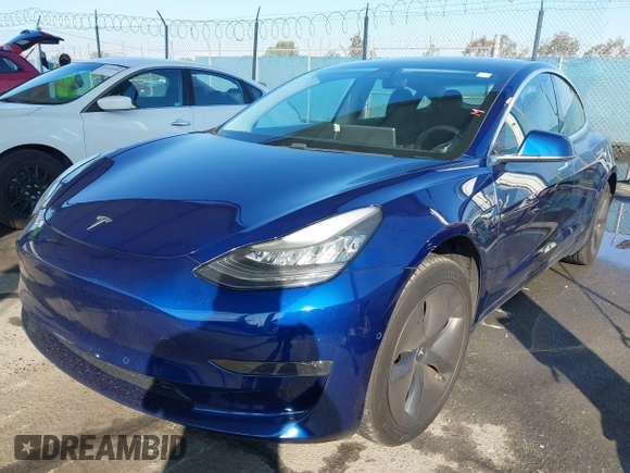 2018 Tesla Model 3 Long Range Battery z VIN 5YJ3E1EA8JF014706, wystawiony jako IAAI lot #41453650 z przebiegiem 68 037 mil mil oraz . Historia ofert i sprzedaży dostępna na DreamBid. Obrazek 19.