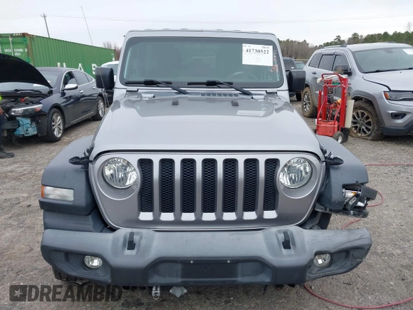 2018 Jeep Wrangler Unlimited Sport z VIN 1C4HJXDG1JW133543, wystawiony jako IAAI lot #41730522 z przebiegiem 81 667 mil mil oraz . Historia ofert i sprzedaży dostępna na DreamBid. Obrazek 12.