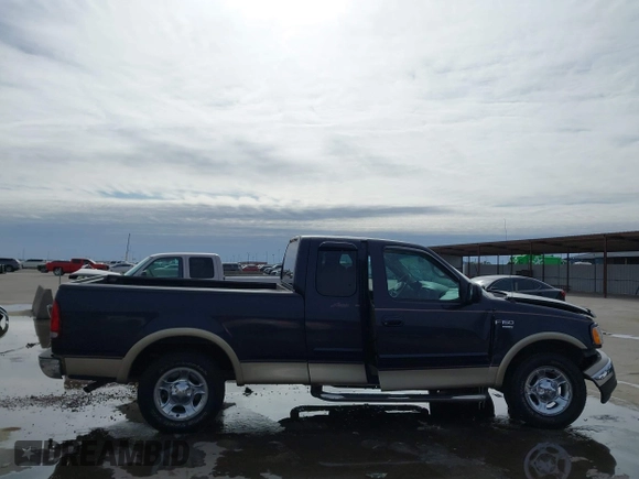 2000 Ford F-150 XL with VIN 1FTRX17L2YNB85627, listed as a IAAI auction lot 41377814 with 123,740 mi miles. Bid and sale history available at carsss.com. Image 14.