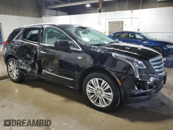 2018 Cadillac XT5 Premium Luxury AWD with VIN 1GYKNFRS7JZ104736, listed as a Copart auction lot 52029565 with 80,263 mi miles and Salvage title. Bid and sale history available at DreamBid. Image 4.