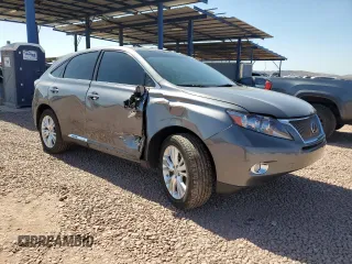2012 Lexus RX 450h with VIN JTJZB1BA4C2408052, listed as a Copart auction lot 47407135 with 136,084 mi miles and Salvage title. Bid and sale history available at DreamBid. Image 4.