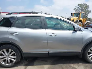 2011 Mazda CX-9 Grand Touring z VIN JM3TB2DA5B0319538, wystawiony jako IAAI lot #42429157 z przebiegiem 88 321 mil mil oraz . Historia ofert i sprzedaży dostępna na DreamBid. Obrazek 14.