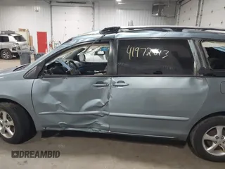 2007 Toyota Sienna CE with VIN 5TDZK23C97S011332, listed as a IAAI auction lot 41972813 with 168,109 mi miles and . Bid and sale history available at DreamBid. Image 14.